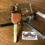 M317 Royal Clover Tan Grained Leather Coin Key (Gold)